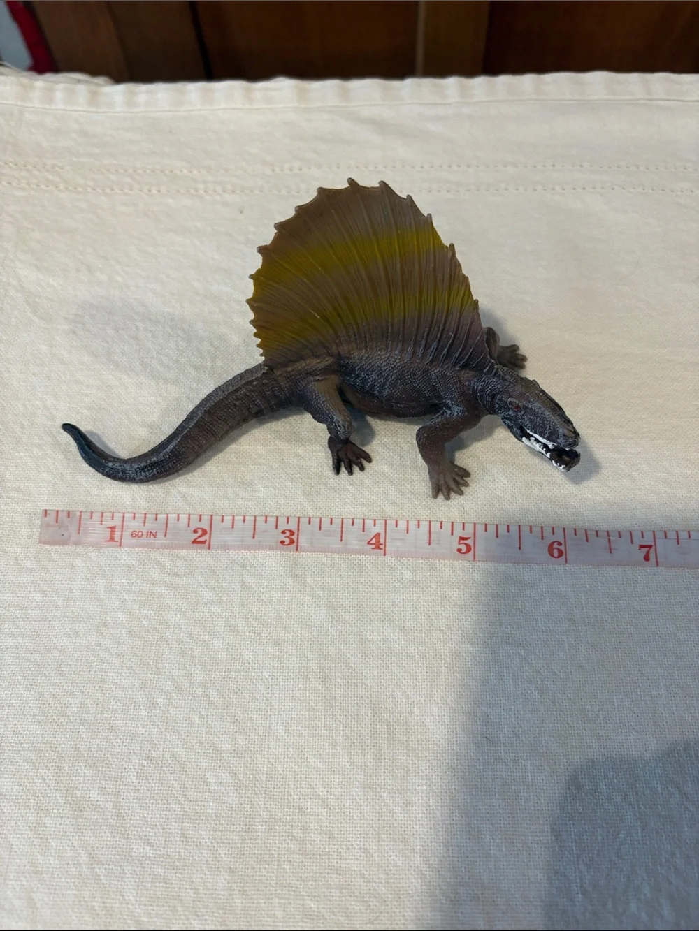 Source Unknown dinosaur brown